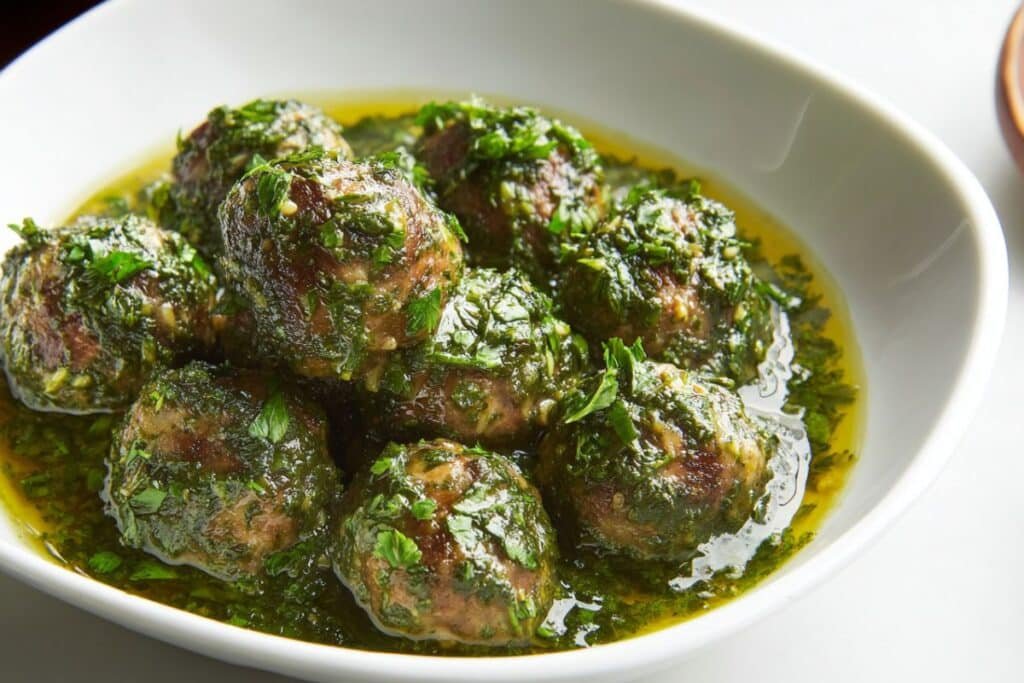 Chicken Meatballs with Molokhieh, Garlic, and Cilantro